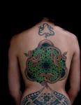 A-large-back-tattoo-of-an-MC-Escher-design-that-features-celtic-knots-and-snakes